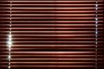 Sunlight Behind Vertical Blinds Stock Photo