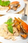 Italian Gnocchi With Seafood Sauce With Crab And Basil Stock Photo