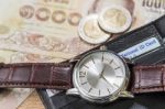 Watch And Wallet On Banknote Stock Photo