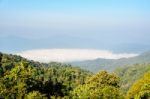 High Mountain And Fog In The Morning Stock Photo