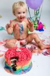 Baby Girl Celebrating Her First Bithday With Gourmet Cake And Ba Stock Photo