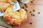 Croissants On Wooden Table Stock Photo