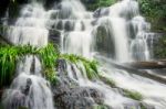 Mun Dang Waterfall In Deep Forest Fresh Green Rain Season In Tha Stock Photo