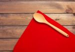 Round Rope Napkin Or Stand, Red Place Mat  And Spoon On A Wooden Stock Photo