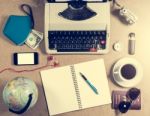 Typewriter And Personal Items On The Table Stock Photo