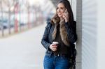 Young Beautiful Woman With Mobile Phone And Coffee Stock Photo