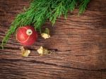 Christmas Fir Tree With Decoration On Dark Wooden Board Stock Photo