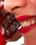 Smiling Girl On Telephone Stock Photo