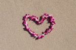 Heart Orchid Flower Garland White Sand Beach Stock Photo