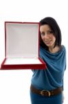 Young Woman Giving Jewelry Box Stock Photo