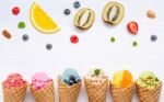 Various Of Ice Cream Flavor In Cones Blueberry ,strawberry ,pist Stock Photo