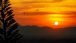 Sunset Over Mountain Range Stock Photo