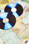 Compact Disks With Euro Money Stock Photo