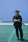 Asian Woman Offshore Helicopter Pilot Is On Offshore Oil Rig Stock Photo