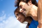 Portrait Of Young Couple Looking At The Horizon Stock Photo