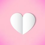 White Paper Heart On Pink Background Stock Photo