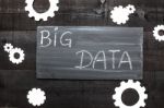 Big Data Letters In A Blackboard And Cogwheels Stock Photo