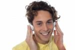 Young Man Listening With Headphones Stock Photo