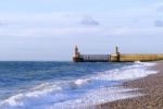 Lighthouse And Beach Stock Photo