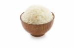 Wooden Bowl Full Of Jasmine Rice On White Background. Thai Rice Stock Photo