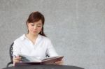 Portrait Of Thai Adult Businesswoman Beautiful Girl Read A Book Stock Photo