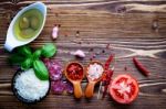 The Ingredients For Homemade Pizza On Shabby Wooden Background Stock Photo