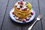 Pancakes With Honey And Berries Stock Photo