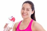 Fitness Woman Smiling And Holding Water Bottle. Isolated On Whit Stock Photo