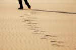 Footprints On The Sand Stock Photo