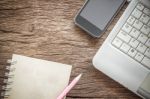 Working Space. Laptop, Notebook, Smartphone On Wooden Desk. Business Concept Stock Photo