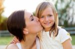 Mother And Daughter Having Fun Outdoors Stock Photo