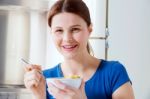 Woman Having Breakfast Stock Photo