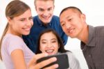 Group Of Multiethnic Friends Taking Self Portrait Stock Photo