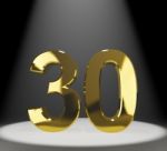 Golden Number 30 With Spotlit Stock Photo