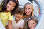 Group Of Childrens Having Fun In The Park Stock Photo