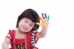 Adorable Little Asian (thai) Girl Painting Her Palm, Isolated On Stock Photo