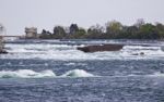 Beautiful Picture With A Broken Boat On The River Right Before The Amazing Niagara Falls Stock Photo