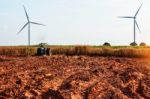 Rural Field With Tractors Were Plowing Stock Photo