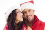 Couple Wearing Christmas Hat Stock Photo