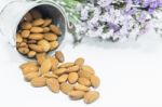 Almond Grains On White Clean Table Stock Photo