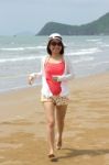 Woman Full Length With Running On The Beach Stock Photo