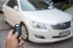 A Hand Press Button Of Remote Control Car Key To Opens A Car Doo Stock Photo