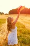 Beautiful Young Blonde Scottish Girl In White Dress At Golden Wh Stock Photo