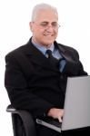 Mature Business Man In Working With Laptop Stock Photo