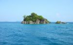 Small Island On Tropical Blue Sea Stock Photo