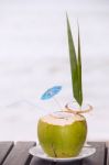 Coconut Water Drink Served In Coconut With Drinking Straw On The Stock Photo