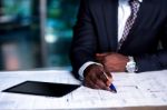 Man Working On Business Development Plan Stock Photo