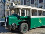 Old Bus In Market Square Bruges Stock Photo