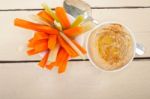 Fresh Hummus Dip With Raw Carrot And Celery Stock Photo