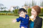 The Grandson With The Grandparents Stock Photo